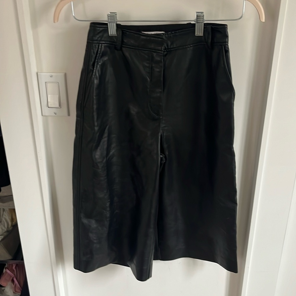 Babaton faux leather knee shorts